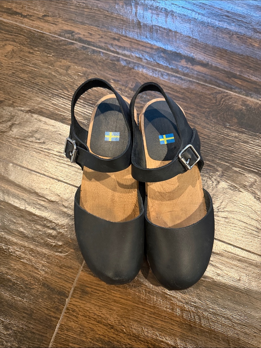Black Swedish-Flag Clog Sandals with Ankle Strap